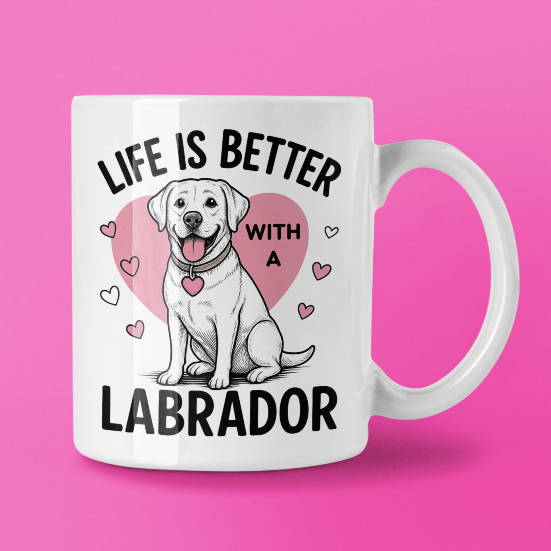 White mug with Labrador illustration and text on a pink background
