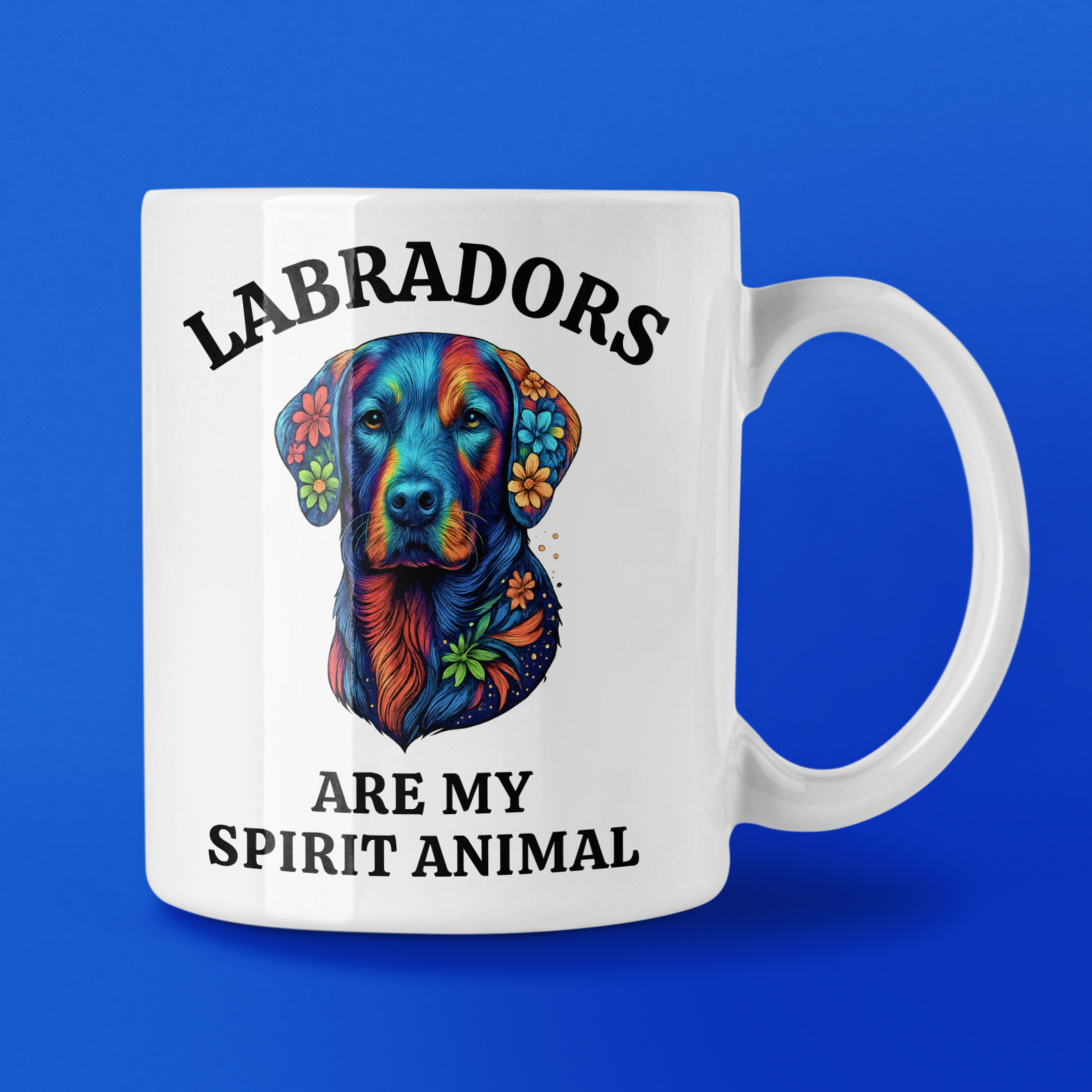 White mug with colorful Labrador design and text on a blue background